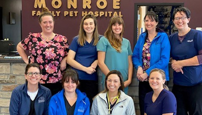 The staff of Monroe Family Pet Hospital posing for a group picture